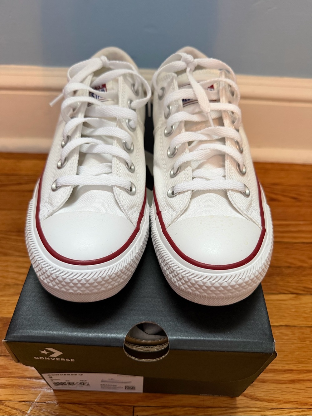 Converse Women’s Low Top Canvas Sneakers in White with Red Trim